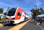 Caltrain paused at Broadway Station-heading away from the camera